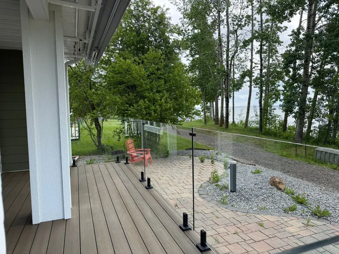 Custom composite deck with aluminum railing in Red Deer, Alberta, built by Green Ladder Contractors