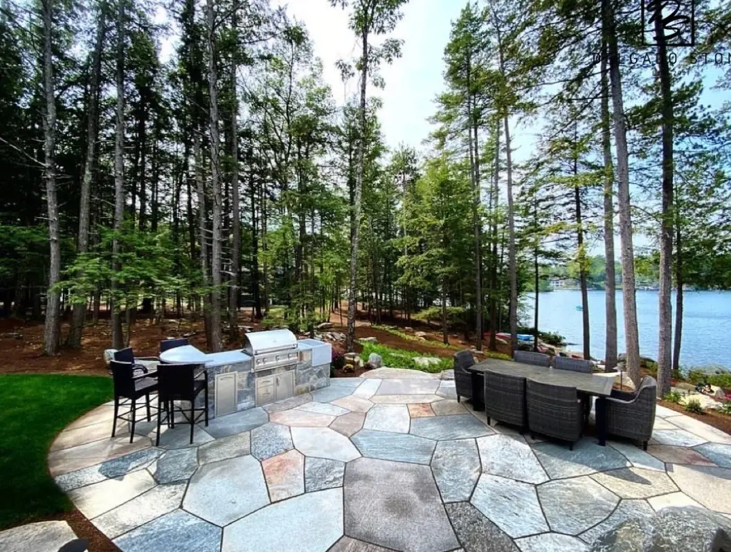 Natural flagstone patio with irregular stone shapes and sand-filled joints